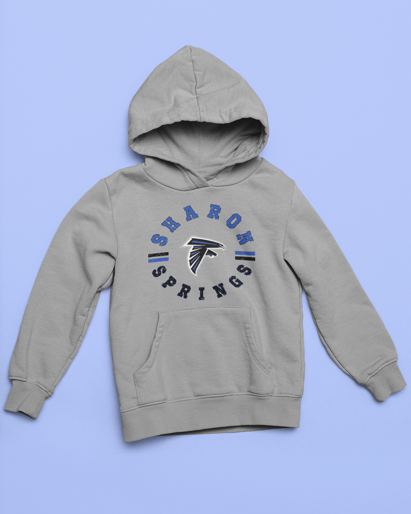 Gray youth unisex sponge fleece pullover hooded sweatshirt with Sharon Springs Falcons  "Vintage Days" logo placed against a solid blue surface