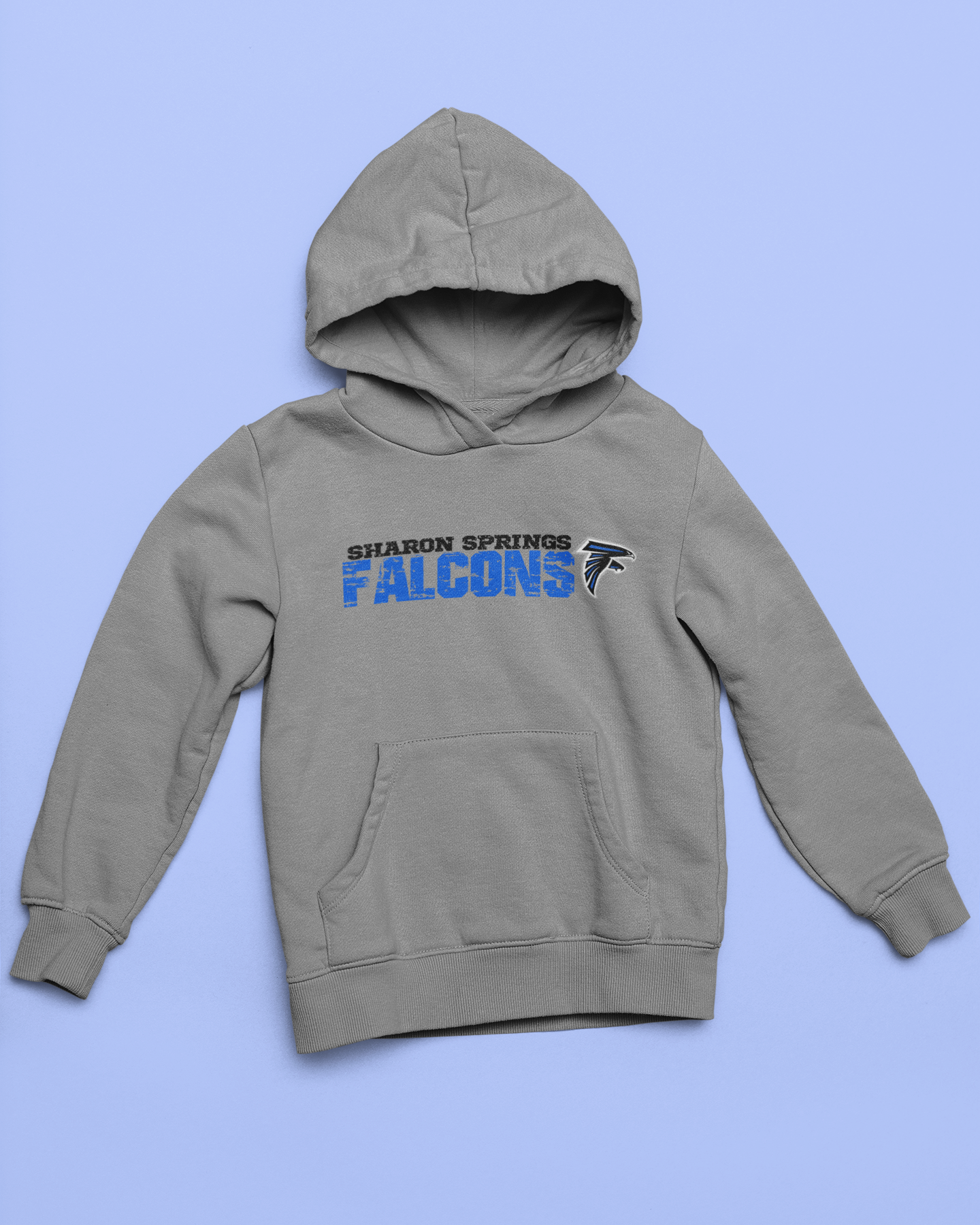 Gray youth unisex sponge fleece pullover hooded sweatshirt with Sharon Springs Falcons  "Distressed logo" placed against a solid blue surface